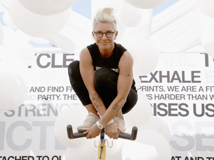 Instructor / author Stacey Griffith leads a class workout at the SoulCycle studio at the A