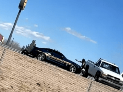 A shootout on Interstate 10 near Las Cruces, NM, left a state police officer dead and another officer wounded. (Video Screenshot, Austin Contreras via KVIA ABC7)