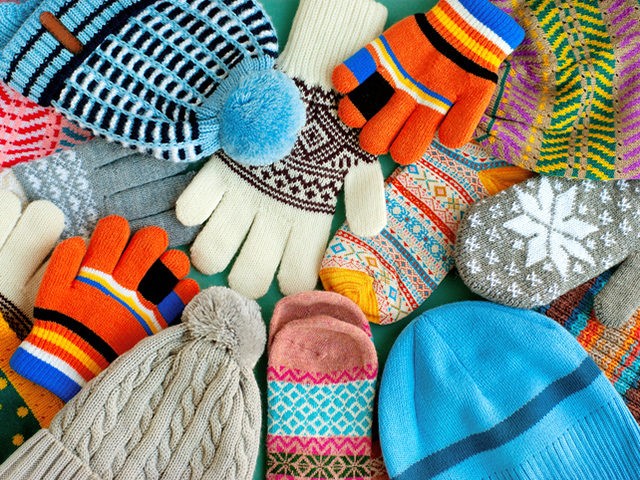 Warm clothes in the form of knitted hats, mittens, gloves, scarves for the cold seasons. M