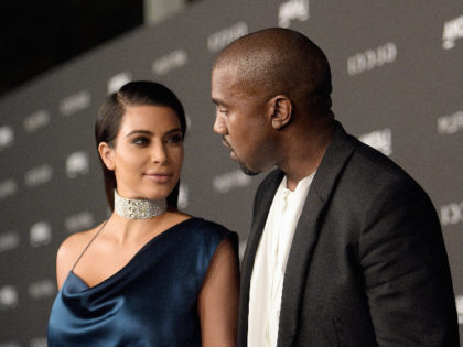 LOS ANGELES, CA - NOVEMBER 01: Recording artist Kanye West (L) and TV personality Kim Kardashian attend the 2014 LACMA Art + Film Gala honoring Barbara Kruger and Quentin Tarantino presented by Gucci at LACMA on November 1, 2014 in Los Angeles, California. (Photo by Jason Kempin/Getty Images for LACMA)