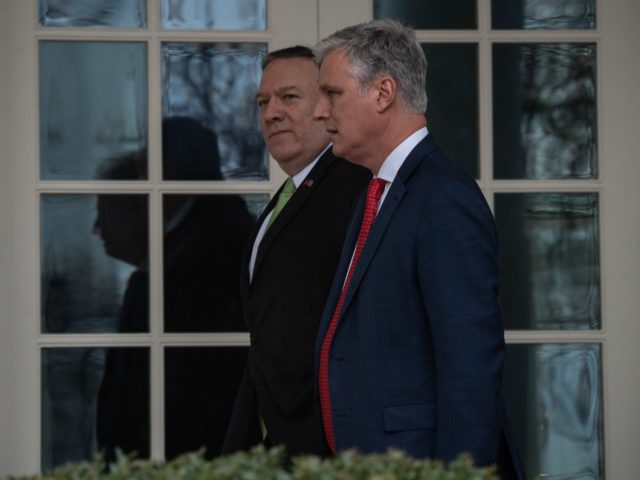 US Secretary of State Mike Pompeo and National Security Advisor Robert O'Brien walk at the