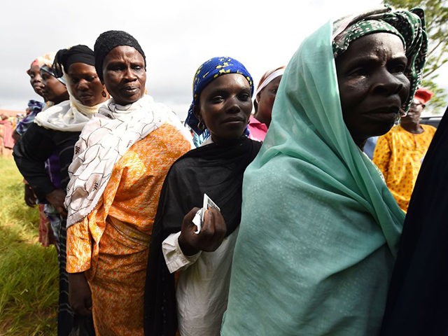 Women queue to cast their vote during the Osun State gubernatorial election in Ede, in the