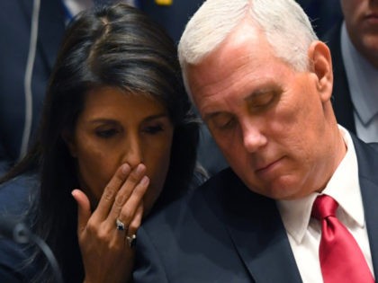 US Vice President Mike Pence (R) and Ambassador to the United Nations Nikki Haley speak at