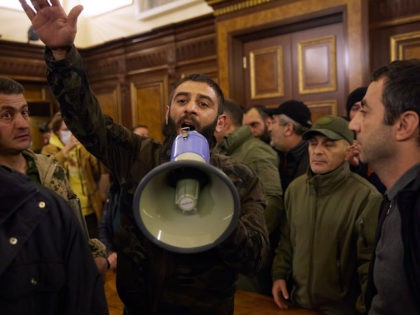 In this file photo, protestors storm Armenian Prime Minister, Nikol Pashinian's office after the announcement of a peace deal in the war between Armenia and Azerbaijan on November 10, 2020 in Yerevan, Armenia. (Alex McBride/Getty Images)