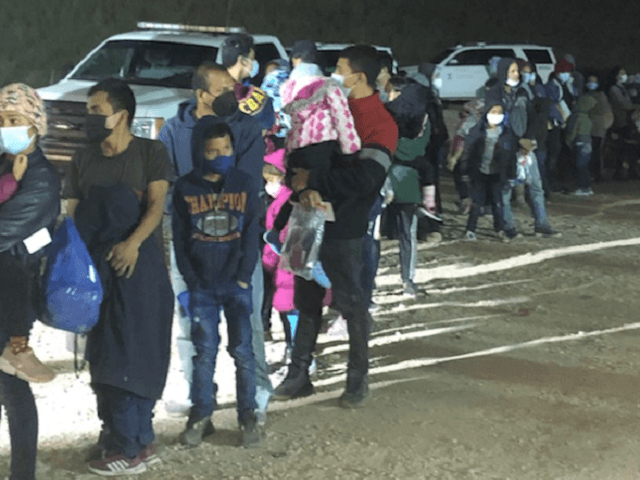 McAllen Station Border Patrol agents apprehend a large group of migrant families and unaccompanied minors near Mission, Texas. (Photo: U.S. Border Patrol/Rio Grande Valley Sector)