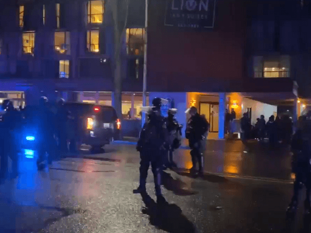 Police take back a Red Lion Hotel in Olympia, WA, after armed homeless activist occupied t