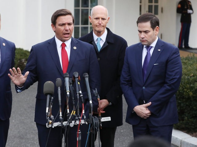 Florida Governor Ron DeSantis speaks to the media while flanked by (L-R) Rep. Mario Diaz-Balart (R-FL), Sen. Rick Scott (R-FL) and Sen. Marco Rubio (R-FL), after a meeting with President Donald Trump regarding Venezuela on January 22, 2019 in Washington, DC. (Photo by Mark Wilson/Getty Images)