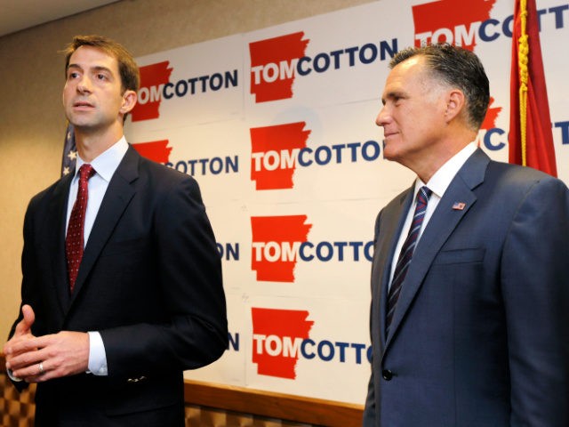U.S. Rep. Tom Cotton, R-Ark., left, speaks at a North Little Rock, Ark., news conference as former Republican Presidential candidate Mitt Romney, right, listens Thursday, Aug. 21, 2014. Romney endorsed Cotton in the race for U.S. Senate Thursday. (AP Photo/Danny Johnston)