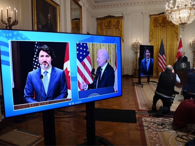 US President Joe Biden and Canadian Prime Minister Justin Trudeau (on screen) speak to the