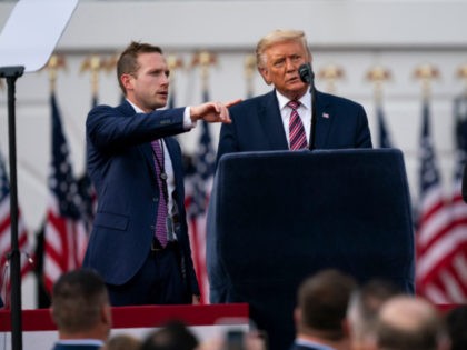 President Donald Trump talks with Deputy Campaign Manager for Presidential Operations Max