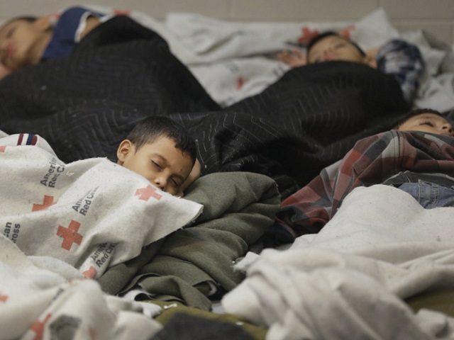 Young detainees sleep in a U.S. Customs and Border Protection holding cell in Brownsville,