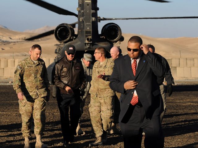 US Vice President Joe Biden (3L) arrives at a US base in Maidan Shar Wardak province on January 11, 2011. US Vice President Joe Biden stressed that his country's troops could stay in Afghanistan after 2014 if Afghans want them to, on day two of a surprise visit to the …