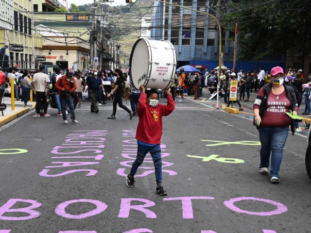 Women march in Tegucigalpa on January 25, 2021 to protest against Congress strengthening the constitutionally mandated ban on abortion and against murders due to male violence. (Photo by Orlando SIERRA / AFP) (Photo by ORLANDO SIERRA/AFP via Getty Images)