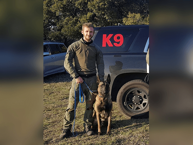 K-9 Officer Rex and his human handler Officer Sarver.