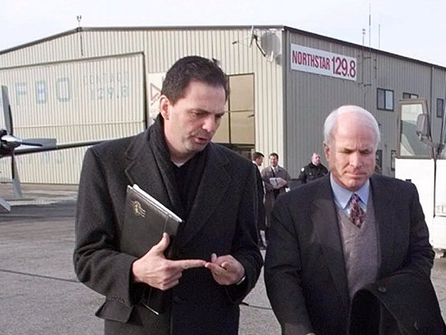 Republican presidential hopeful Sen. John McCain, of Arizona, center, walks across the tarmac at T.F. Green Airport in Warwick, R.I., with political director John Weaver, left, and political advisor Mike Murphy Tuesday afternoon, Jan. 18, 2000. Unlike every other presidential candidate, McCain has foregone Iowa for the states where he …