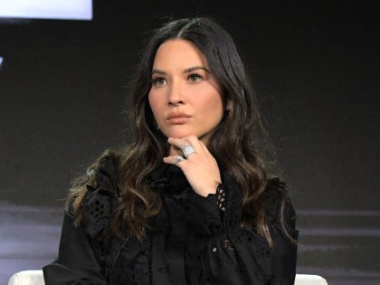 LOS ANGELES, CALIFORNIA - FEBRUARY 12: Olivia Munn of 'The Rook' speaks onstage during Starz 2019 Winter TCA Panel & All-Star After Party on February 12, 2019 in Los Angeles, California. (Photo by Charley Gallay/Getty Images for Starz)