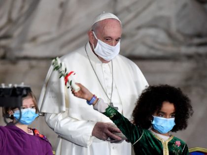 Pope Francis, wearing a face mask, attends a ceremony for peace with representatives from various religions in Campidoglio Square, in rome on October 20, 2020. (Photo by Andreas SOLARO / AFP) (Photo by ANDREAS SOLARO/AFP via Getty Images)