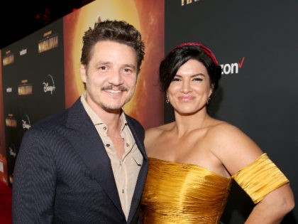 HOLLYWOOD, CALIFORNIA - NOVEMBER 13: Pedro Pascal and Gina Carano arrive at the premiere of Lucasfilm's first-ever, live-action series, "The Mandalorian," at the El Capitan Theatre in Hollywood, Calif. on November 13, 2019. "The Mandalorian" streams exclusively on Disney+. (Photo by Jesse Grant/Getty Images for Disney)