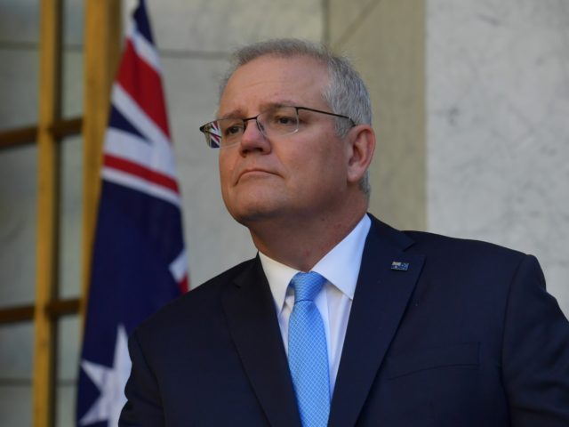 CANBERRA, AUSTRALIA - DECEMBER 11: Prime Minister Scott Morrison reacts during a press conference in the Prime Ministers courtyard on December 11, 2020 in Canberra, Australia. Clinical trials of a COVID-19 vaccine being developed by the University of Queensland in partnership with biotech company CSL will be abandoned, after the …