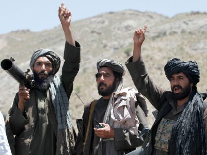 FILE - In this May 27, 2016 file photo, Taliban fighters react to a speech by a senior leader of a breakaway faction of the Taliban, Mullah Abdul Manan Niazi, in the Shindand district of Herat province, Afghanistan. Taliban officials say the extremist group has appointed Maulvi Ibrahim Sadar as …