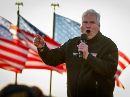 Rep. Tom Emmer, R-Minn., addresses a crowd at a campaign rally for President Donald Trump