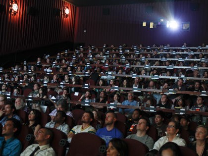 The audience watches the premiere of Mel Gibson's new film GET THE GRINGO at the Alamo Drafthouse in Austin, Texas, Wednesday, April 18, 2012. The event is part of a 10-city national promotion for the movie, which premieres on DIRECTV on May first. GET THE GRINGO is produced by Icon …