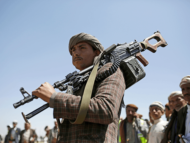 A Shiite Houthi tribesman holds his weapon during a tribal gathering showing support for the Houthi movement, in Sanaa, Yemen, Saturday Sept. 21, 2019. Yemen's Houthi rebels said late Friday night that they were halting drone and missile attacks against Saudi Arabia, one week after they claimed responsibility for a strike that crippled a key oil facility in the kingdom. (AP Photo/Hani Mohammed)