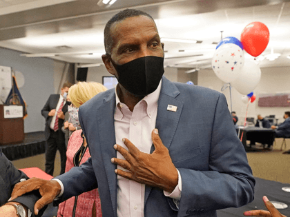 Burgess Owens, Republican candidate in Utah's 4th Congressional District, speaks with people during an Utah Republican election night party Tuesday, Nov. 3, 2020, in Sandy, Utah. The hard-fought race for a congressional swing district in Utah remained too early to call on Thursday, Nov. 5, 2020, with just 18 votes …
