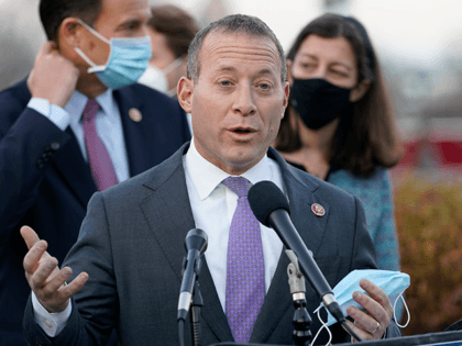 Problem Solvers Caucus co-chair Rep. Josh Gottheimer, D-N.J., speaks to the media with mem