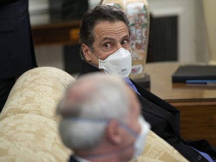 Gov. Andrew Cuomo, D-N.Y., listens to a question during a meeting between President Joe Bi