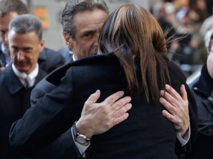 New York incumbent Democratic Gov. Andrew Cuomo hugs a supporter after giving a campaign speech in New York's Times Square, Monday, Nov. 3, 2014. He faces Republican challenger Rob Astorino in Tuesday's election. (AP Photo/Mark Lennihan)