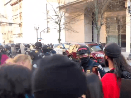 Antifa attacks federal courthouse shortly after physical barrier taken down. (Twitter Video Screenshot/@fvckcommies)