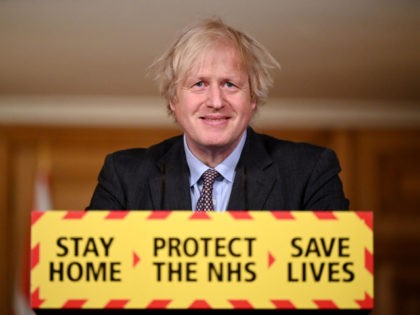 LONDON, ENGLAND - FEBRUARY 22: British Prime Minister Boris Johnson smiles during a televised press conference at 10 Downing Street on February 22, 2021 in London, England. The prime minister announced a phased exit from the country's current lockdown measures, imposed before Christmas to curb a surge in covid-19 cases. …