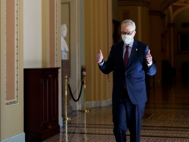 Senate Majority Leader Chuck Schumer of N.Y., gives a thumbs up after he Senate passed a COVID-19 relief bill in Washington, Saturday, March 6, 2021. (AP Photo/J. Scott Applewhite)