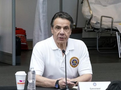 New York Governor Andrew Cuomo speaks to National Guard members and the media at the Javits Convention Center which is being turned into a hospital to help fight coronavirus cases on March 27, 2020 in New York City. across the country schools, businesses and places of work have either been …