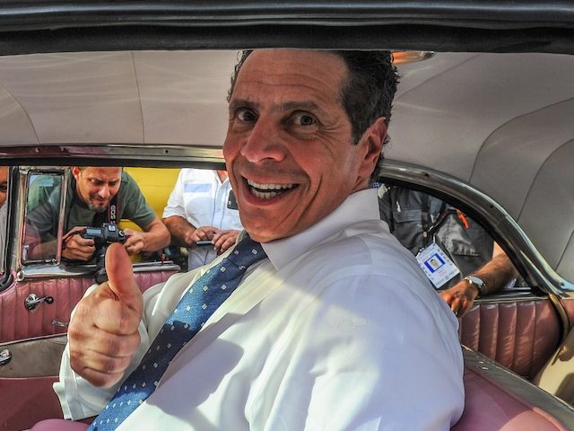 New York Governor Andrew Cuomo sits inside a vintage US car, on April 20, 2015. (Yamil Lag