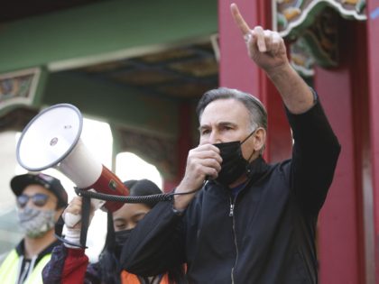 King County Executive Dow Constantine speaks during the "We Are Not Silent" rally against anti-Asian hate in response to recent anti-Asian crime in the Chinatown-International District of Seattle, Washington on March 13, 2021. - Reports of attacks, primarily against Asian-American elders, have spiked in recent months -- fuelled, activists believe, …