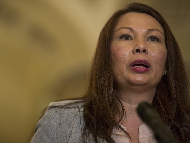 Sen. Tammy Duckworth (D-IL) speaks during a weekly news conference on Capitol Hill on August 21, 2018 in Washington, DC. (Zach Gibson/Getty Images)