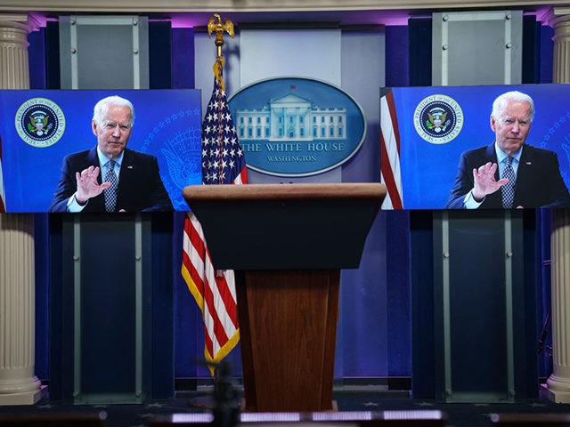 WASHINGTON, DC - FEBRUARY 25: U.S. President Joe Biden is displayed on screens in the Whit