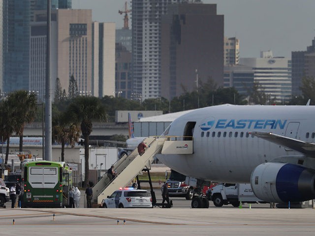 FORT LAUDERDALE, FLORIDA - APRIL 03: People who were passengers on the Zaandam and Rotterdam cruise ship board an Eastern Airlines charter flight at Fort Lauderdale-Hollywood International airport on April 03, 2020 in Fort Lauderdale, Florida. The passengers were on the Holland America cruise ships Zaandam and Rotterdam and had …