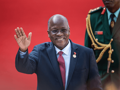 Tanzanian President John Pombe Magufuli gestures while arriving at the Loftus Versfeld Stadium in Pretoria, South Africa, for the inauguration of Incumbent South African President Cyril Ramaphosa on May 25, 2019. (Photo by Michele Spatari / AFP) (Photo credit should read MICHELE SPATARI/AFP via Getty Images)