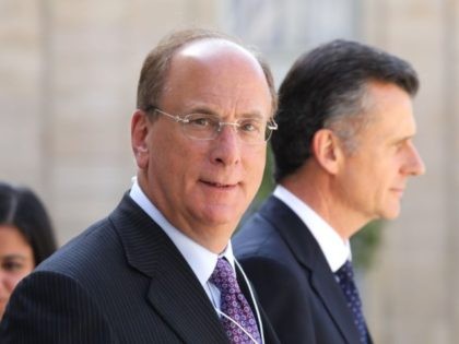 Chairman and CEO of BlackRock, Larry Fink (L) leaves after a meeting about climate action investments with heads of sovereign wealth funds and French President at the Elysee Palace in Paris on July 10, 2019. (Photo by Ludovic MARIN / AFP) (Photo credit should read LUDOVIC MARIN/AFP via Getty Images)