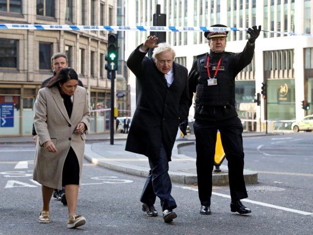 LONDON, ENGLAND - NOVEMBER 30: British Prime Minister Boris Johnson, Home Secretary Priti