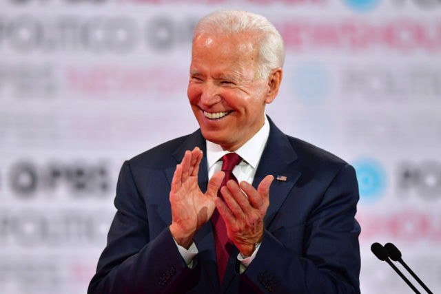 Democratic presidential hopeful former Vice President Joe Biden laughs during the sixth Democratic primary debate of the 2020 presidential campaign season co-hosted by PBS NewsHour & Politico at Loyola Marymount University in Los Angeles, California on December 19, 2019. (Photo by Frederic J. Brown / AFP) (Photo by FREDERIC J. …