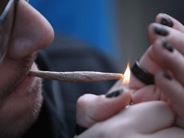 A recreational marijuana smoker indulges in smoking weed on April 14, 2020 in the Bushwick
