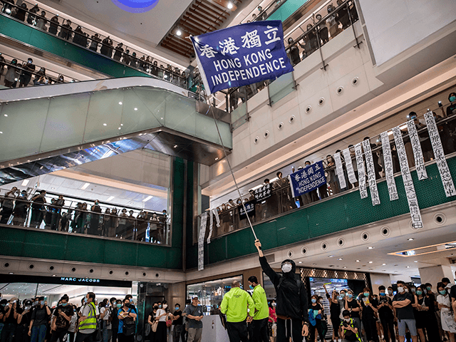 Protesters attend a pro-democracy rally at the New Town Plaza shopping mall in the Sha Tin