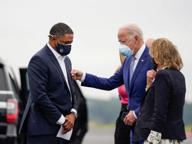 COLUMBUS, GA - OCTOBER 27: (L-R) Rep. Cedric Richmond (D-LA) and Democratic presidential nominee Joe Biden greet each other as Biden arrives at Columbus Airport on October 27, 2020 in Columbus, Georgia. Biden is campaigning in Georgia on Tuesday, with scheduled stops in Atlanta and Warm Springs. (Photo by Drew …