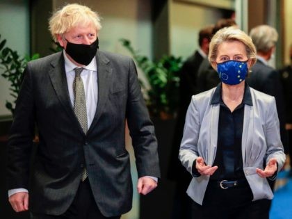 Britain's Prime Minister Boris Johnson (L) is welcomed by European Commission President Ursula von der Leyen (R) in the Berlaymont building at the EU headquarters in Brussels on December 9, 2020, prior to a post-Brexit talks' working dinner. - EU chief Ursula von der Leyen welcomed Britain's Prime Minister Boris …