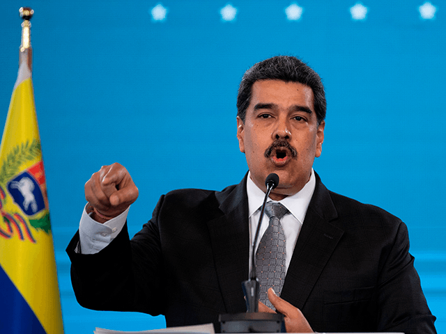 Venezuelan President Nicolas Maduro gestures while speaking during a press conference at Miraflores Presidential Palace in Caracas on February 17, 2021. - Venezuela will start its vaccination campaign against COVID-19 on February 18, after the arrival of the first 100,000 doses of Russian Sputnik V vaccines, including in this first …