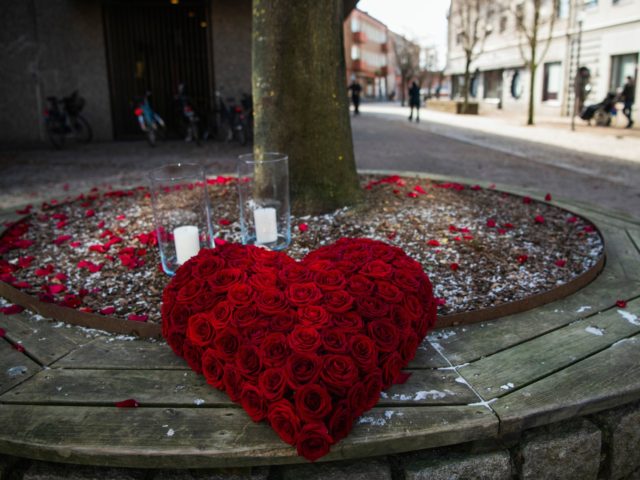 A heart-shaped bouquet of roses is placed in the main street of the city of Vetlanda on Ma